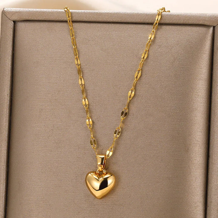 Sterling silver heart pendant necklace for women, an elegant & romantic love charm accessory.