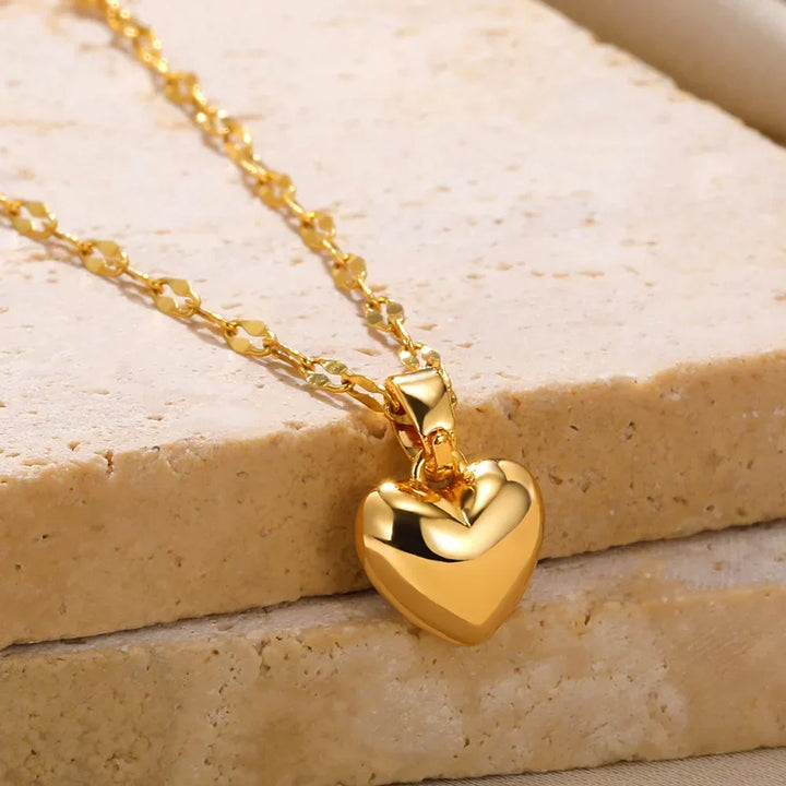 Romantic sterling silver heart pendant necklace, a timeless elegant love charm for women.