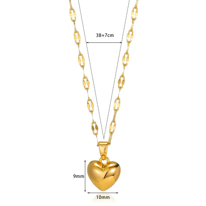 Product shot: Elegant sterling silver heart pendant necklace, a refined women's fashion accessory.
