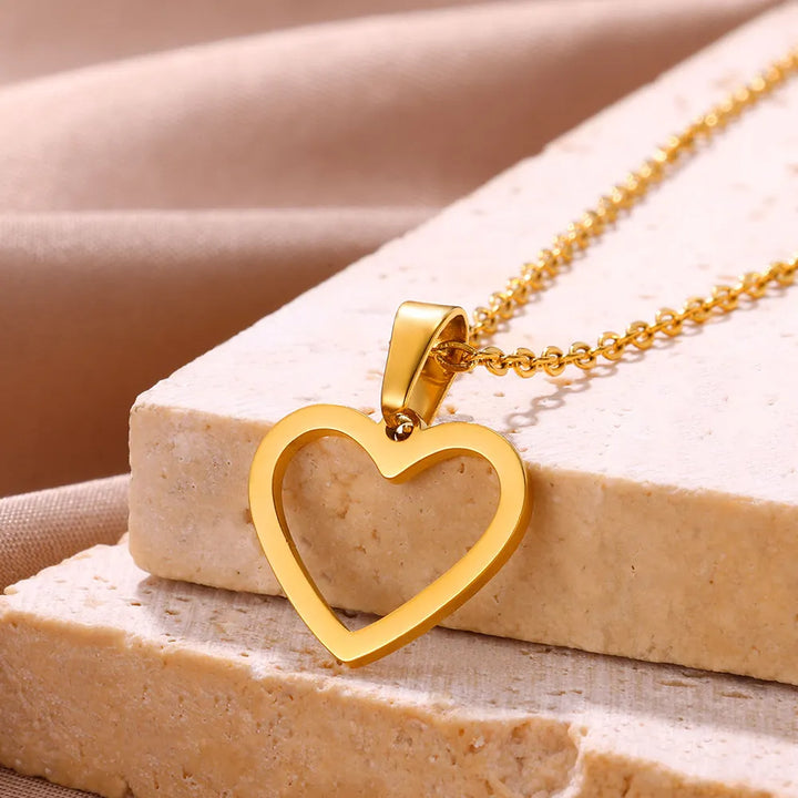 Shimmering sterling silver heart pendant necklace with fine chain, elegant women's jewellery.