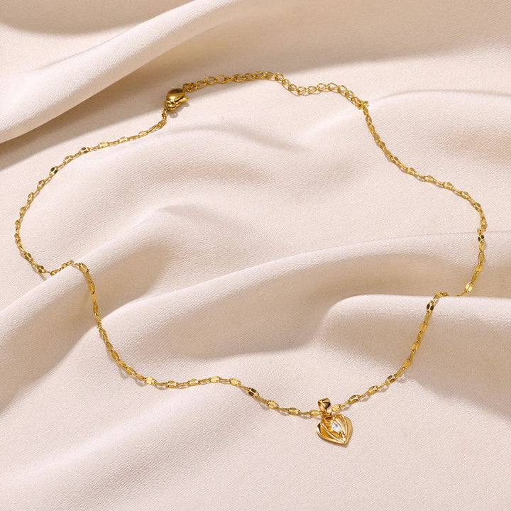 A charming sterling silver heart pendant necklace, elegant fine jewelry for women.