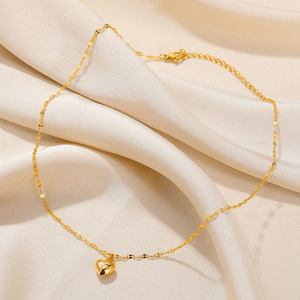 Women's elegant sterling silver heart pendant necklace, a beautiful love accessory.