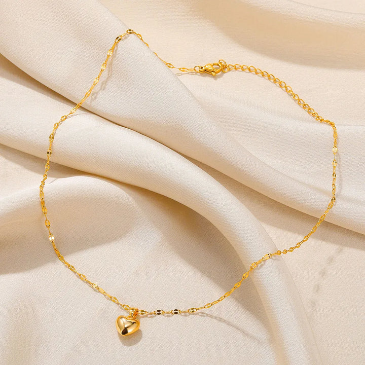 Women's elegant sterling silver heart pendant necklace, a beautiful love accessory.