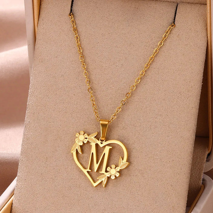 Gift-ready sterling silver personalized heart initial necklace. Custom letter pendant, a thoughtful custom jewellery gift.