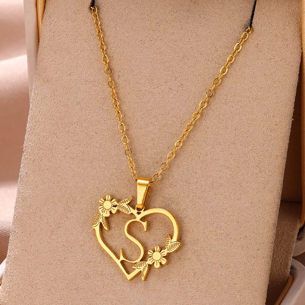 Detailed view of a unique personalized heart initial necklace with a custom letter, crafted from sterling silver.