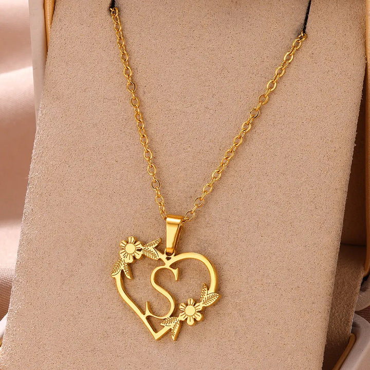 Detailed view of a unique personalized heart initial necklace with a custom letter, crafted from sterling silver.