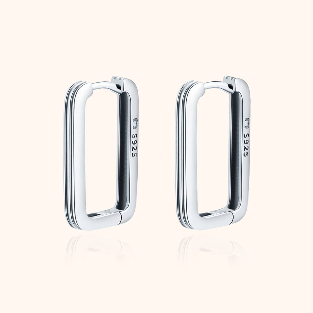 Sterling silver rectangular clip-on earrings for women, minimalist & modern. Elegant non-pierced jewelry for everyday wear.