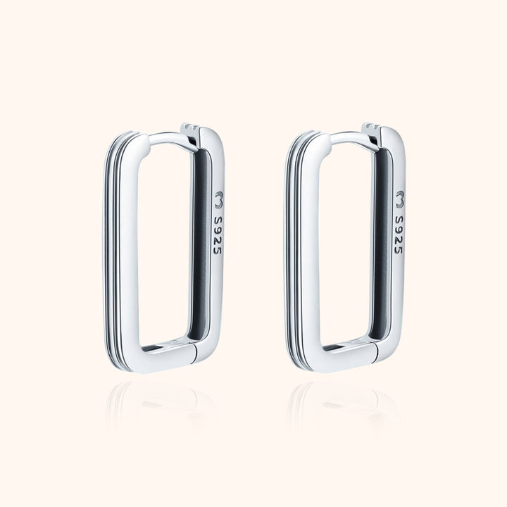 Sterling silver rectangular clip-on earrings for women, minimalist & modern. Elegant non-pierced jewelry for everyday wear.