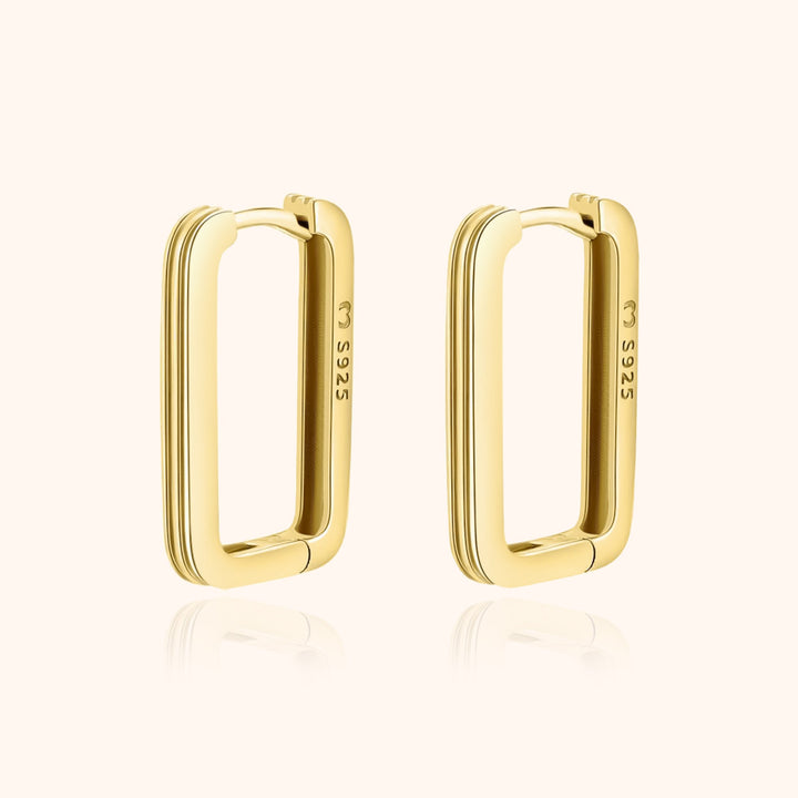 Sleek rectangular clip-on earrings for women, available in silver or gold. Modern minimalist jewelry, ideal for everyday style.