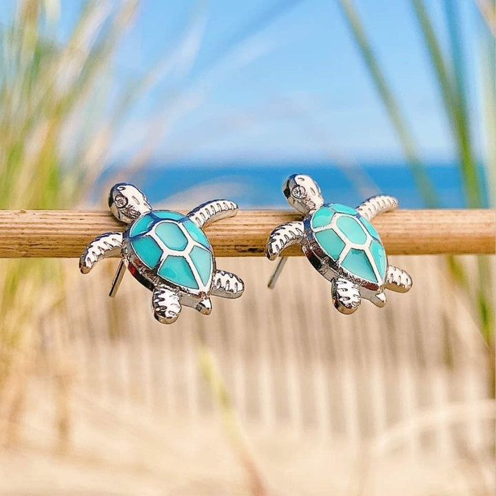 Sterling silver sea turtle opal earrings for women with shimmering blue opal. Ocean animal jewelry, trendy gift for her.