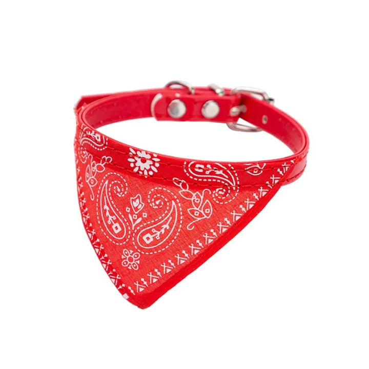 Stylish adjustable cat bandana collar for fashionable felines.