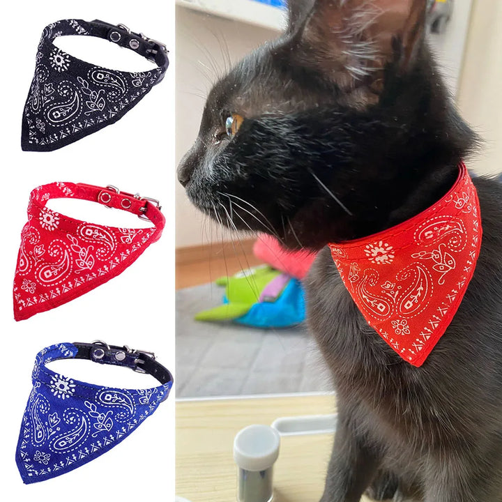 Soft fabric cat bandana collar with adjustable strap; comfortable pet fashion accessory.