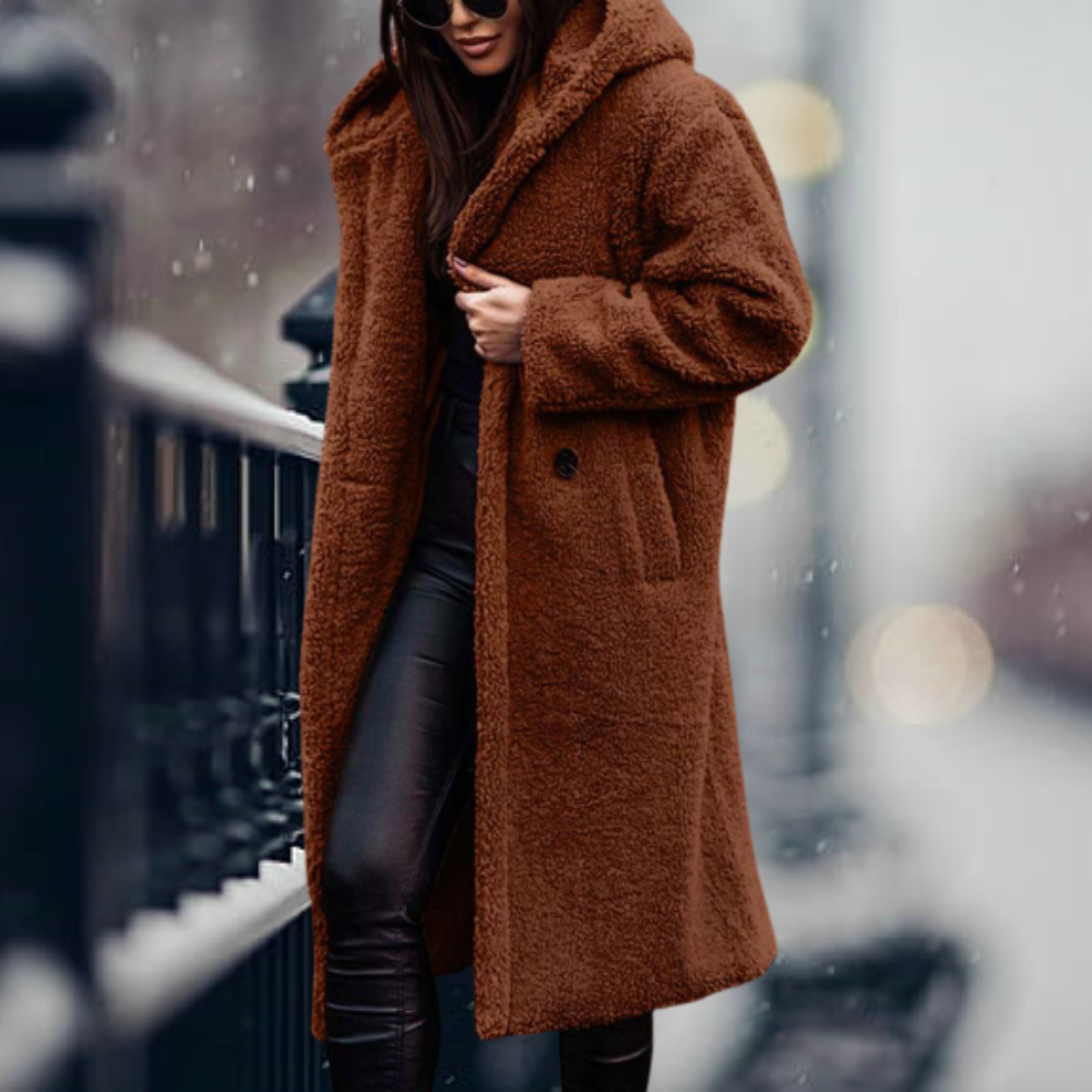 Amara women's long winter coat, offering warmth and comfort. Essential stylish outerwear for cold weather protection.