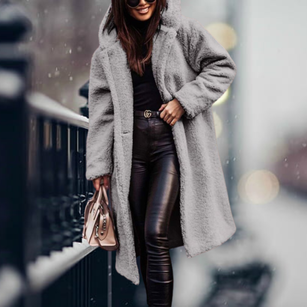 Elegant Amara women's long winter coat, warm and comfortable. Perfect stylish outerwear for cold weather daily fashion.