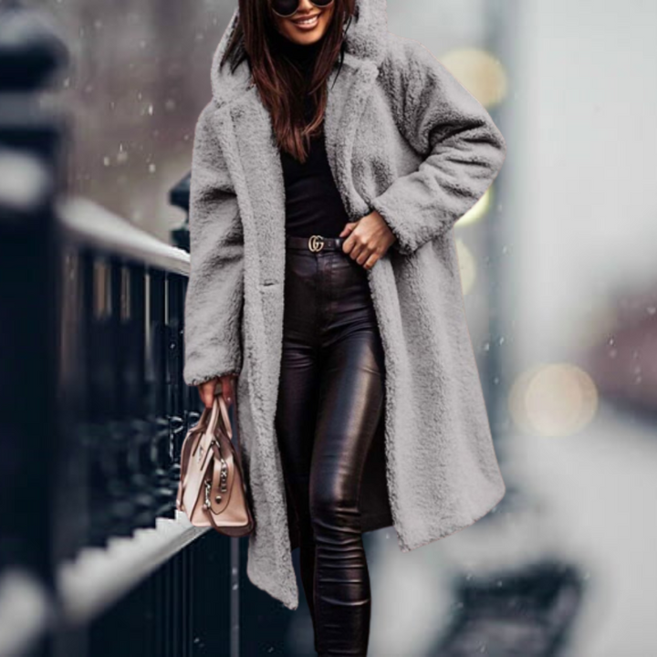 Elegant Amara women's long winter coat, warm and comfortable. Perfect stylish outerwear for cold weather daily fashion.