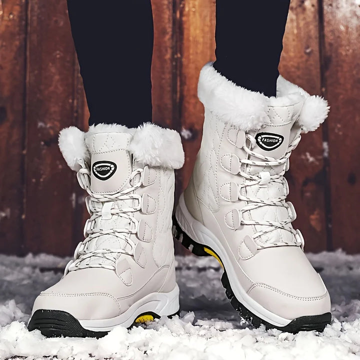 Stylish Aurora women's mid-calf winter snow boots. Cozy and warm for cold weather comfort.