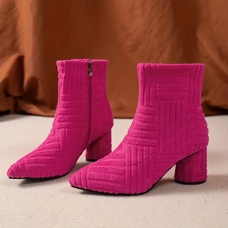 Stylish & comfortable black women's ankle boots with a durable block heel for everyday fashion.