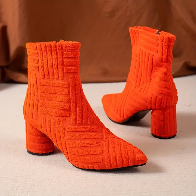 Ladies' stylish black ankle boots with a comfortable block heel and pointed toe, all-season footwear.