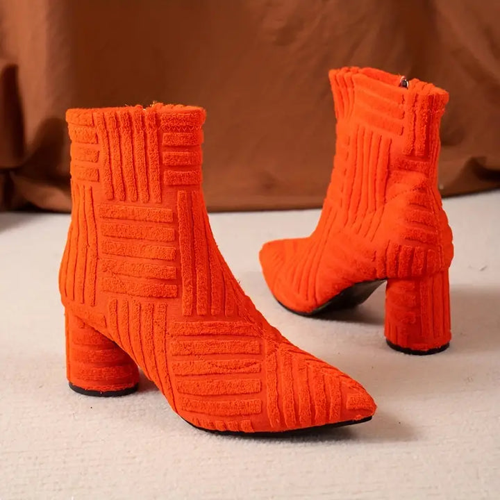 Ladies' stylish black ankle boots with a comfortable block heel and pointed toe, all-season footwear.