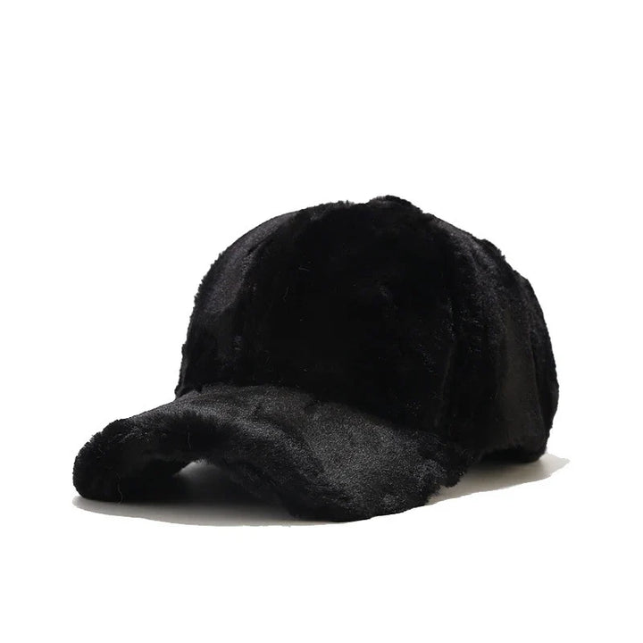 Warm brown faux fur winter cap for women. Plush and soft headwear, perfect cold weather accessory.