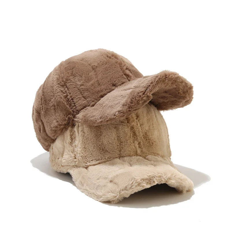 Adjustable women's plush faux fur winter cap. Warm and stylish headwear, perfect for cold weather.