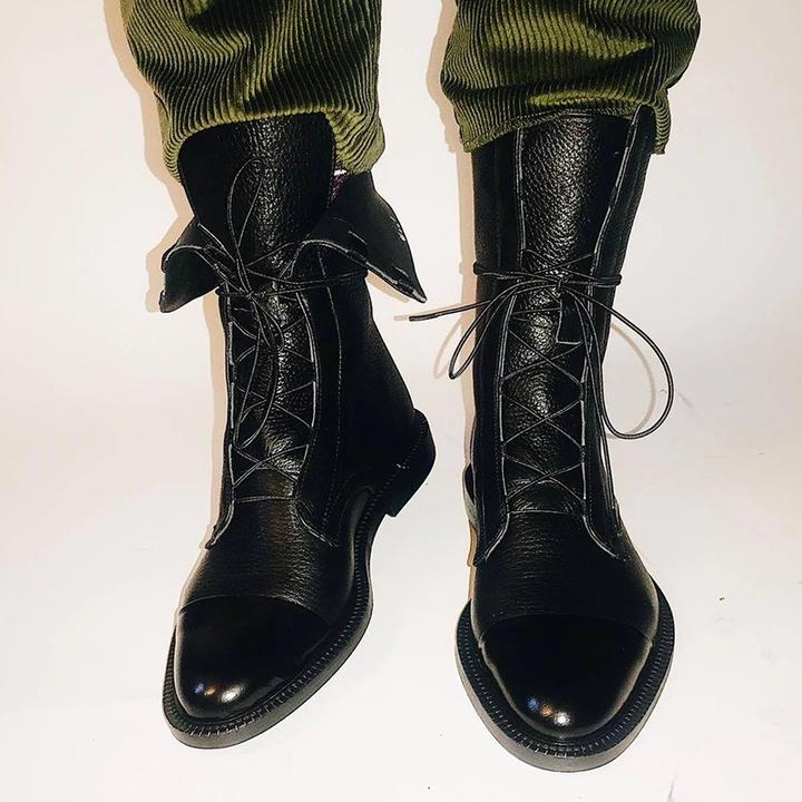 Chic black high lace-up boots for women, Liana, a versatile and refined footwear choice.
