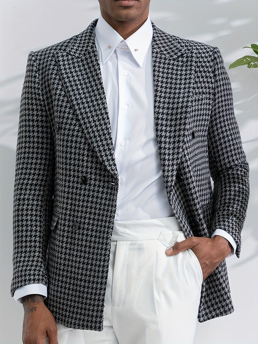 Stylish black & white checked men's blazer. Versatile fashion for smart casual or business.