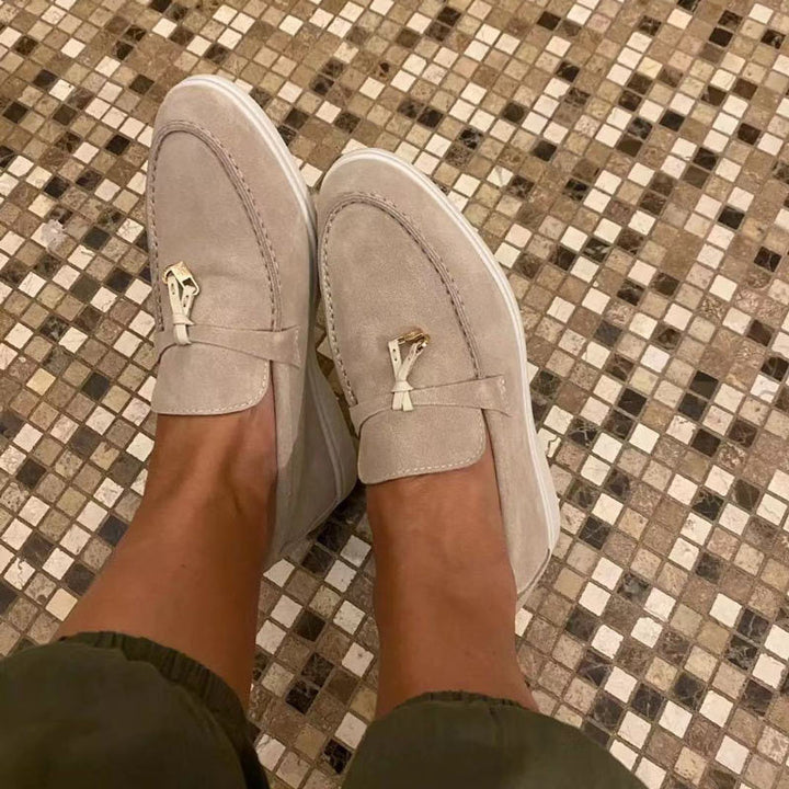 Fashionable women's footwear: comfortable loafers with an elegant clasp, ideal as dress shoes or casual wear.