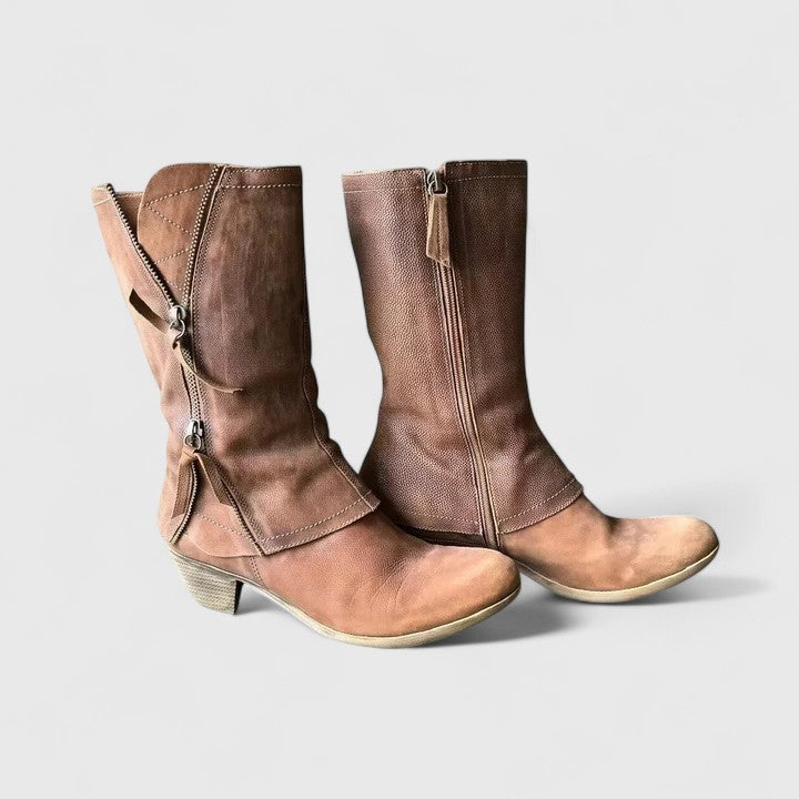 Stylish brown women's orthopedic boots, offering all-day comfort and support for fall and winter footwear.