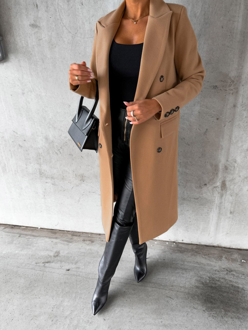 Warm & comfortable Vivienne women's long winter coat. Stylish hooded outerwear for cold weather, a fashion essential.