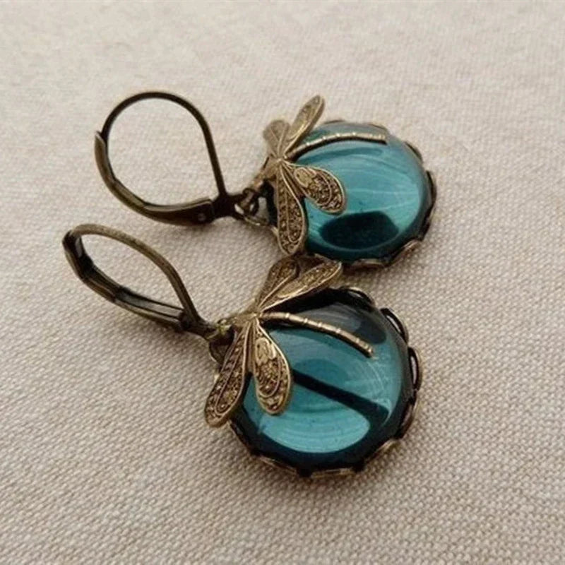 Stylish crystal antique gold drop earrings for women, perfect for elegant fashion accessories.