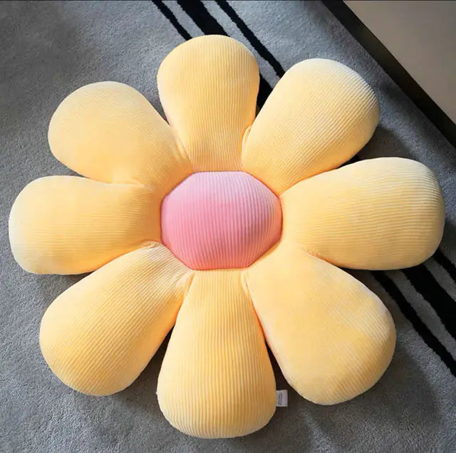 Unique flower cushion, adds a cozy floral decor touch.