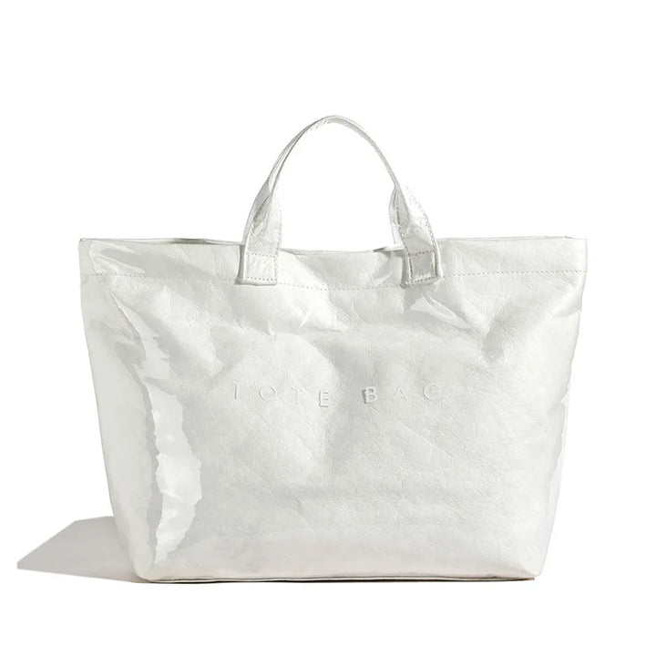 Eye-catching glossy women's tote bag, a stylish and durable everyday handbag.