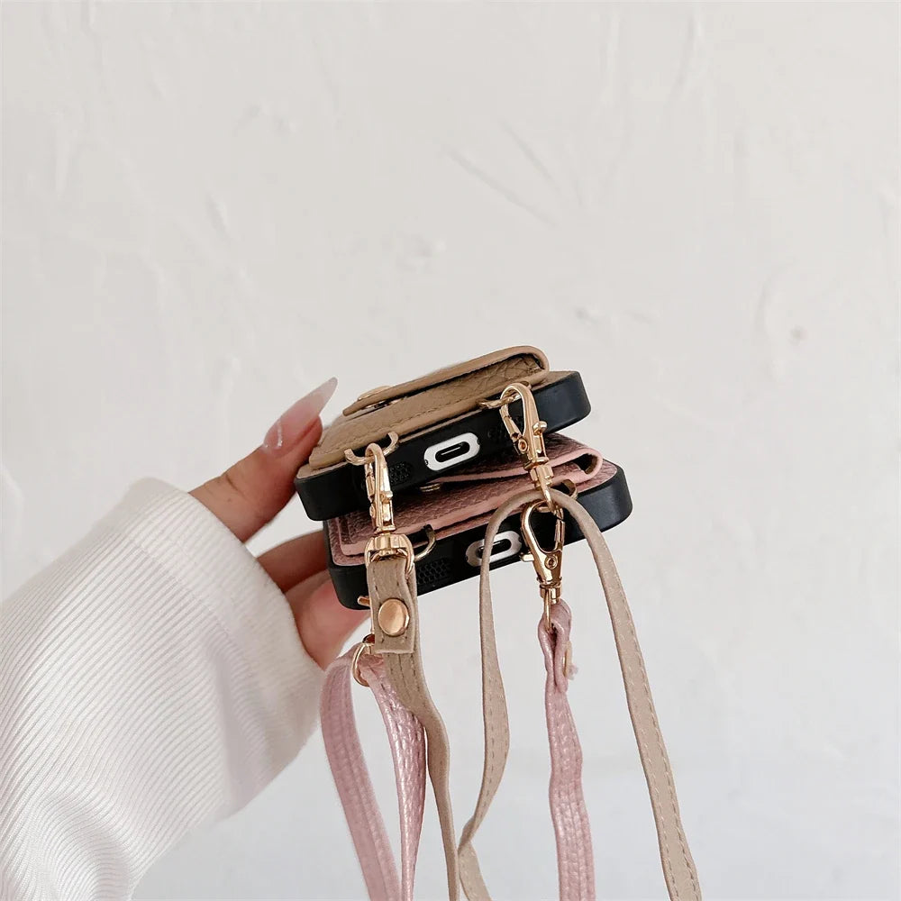 Chic mobile fashion accessory: an iPhone wallet case with a removable strap, blending utility and design.