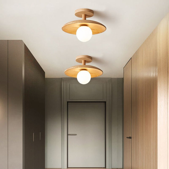 Modern Japanese wooden ceiling lamp, natural and minimalist lighting for tranquil spaces.