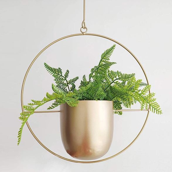 Scandinavian style hanging planter, enhancing indoor home decor with natural greenery.