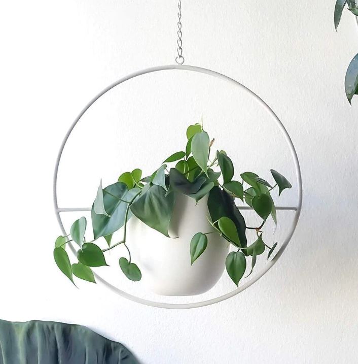 Elegant LeafLuxe hanging planter, a modern accent for any home or garden setting.