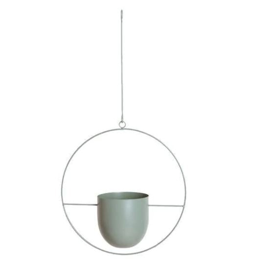 Contemporary metal hanging planter for wall decor, perfect for small indoor gardens.