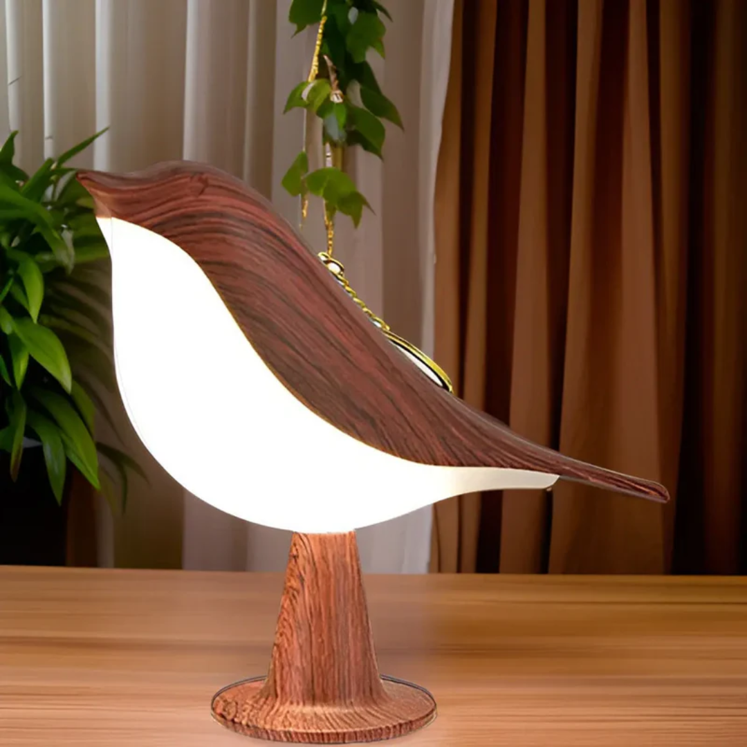 Stylish LED bird lamp with touch control & aromatherapy. Cordless accent light for home decor.