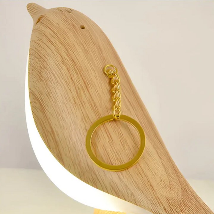 Modern LED bird accent lamp with intuitive touch control and relaxing aromatherapy diffusion.