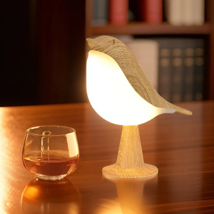 FeatherGlow LED bird lamp: A cordless, rechargeable mood light with touch dimming & essential oil diffuser.