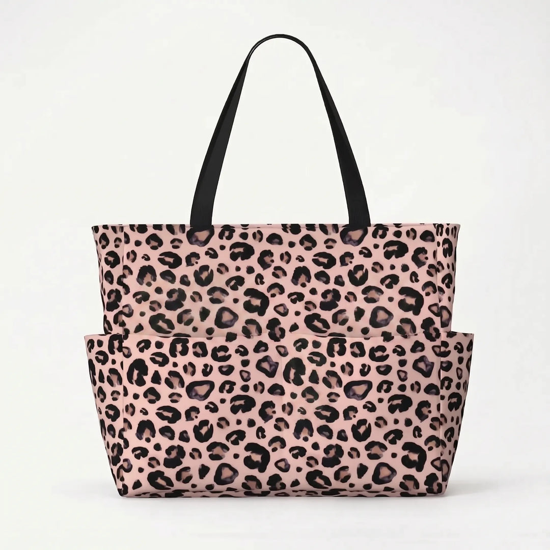 Angled shot of the spacious leopard print beach bag, a must-have women's summer fashion accessory.