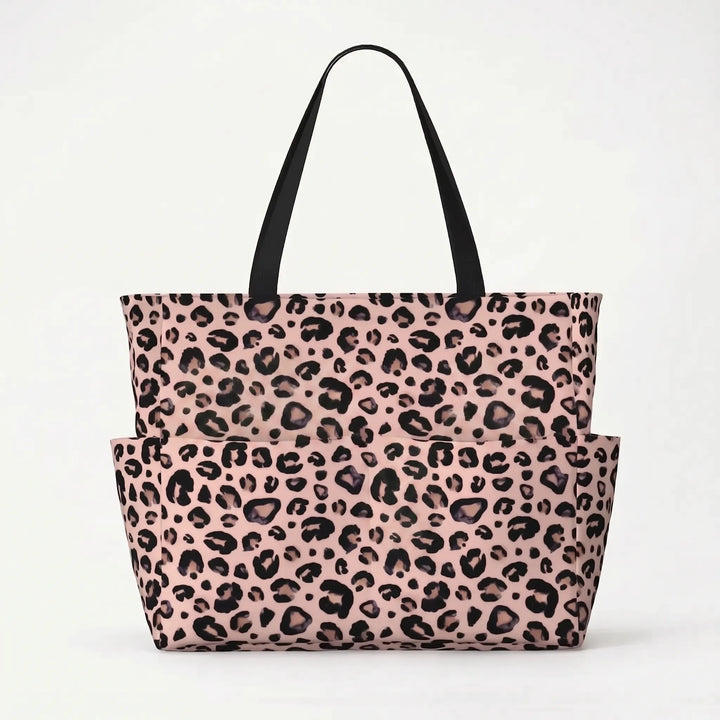 Angled shot of the spacious leopard print beach bag, a must-have women's summer fashion accessory.