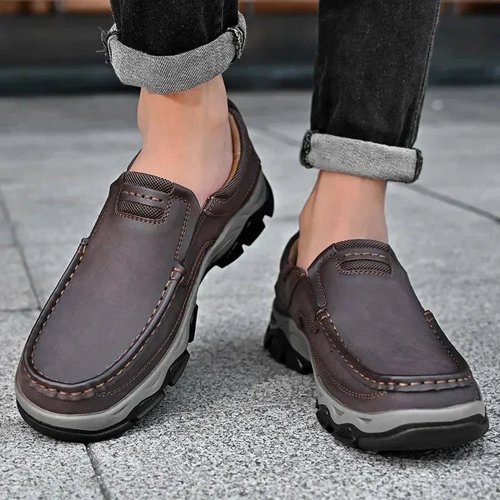 Stylish black men's orthopedic shoes, offering superior comfort for both casual and dress wear.