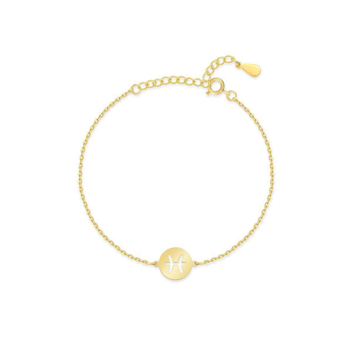 Close-up of Lyra Zodiac symbol on a gold plated sterling silver bracelet, minimalist design