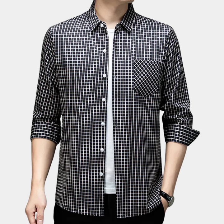 Stylish men's black checked button-down shirt. Versatile long-sleeve top for casual or smart-casual wear.