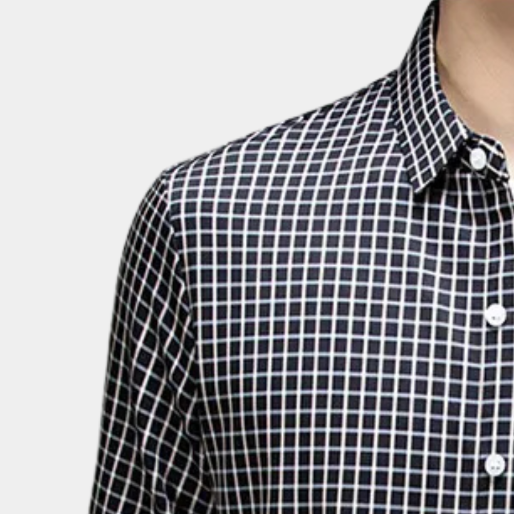 Men's fashionable long-sleeve black checked button-down shirt. Perfect for versatile modern men's fashion.
