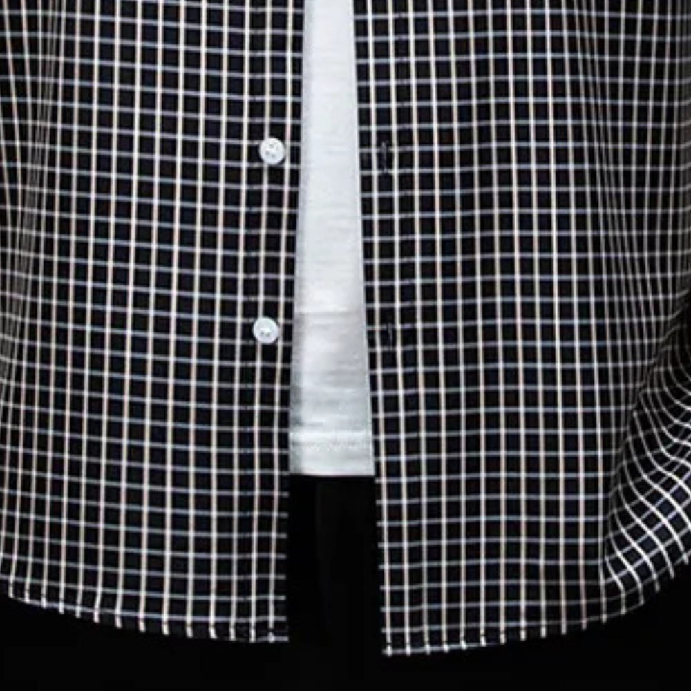 Versatile men's black checked button-down long-sleeve shirt. Ideal for layering or as a stand-alone piece.