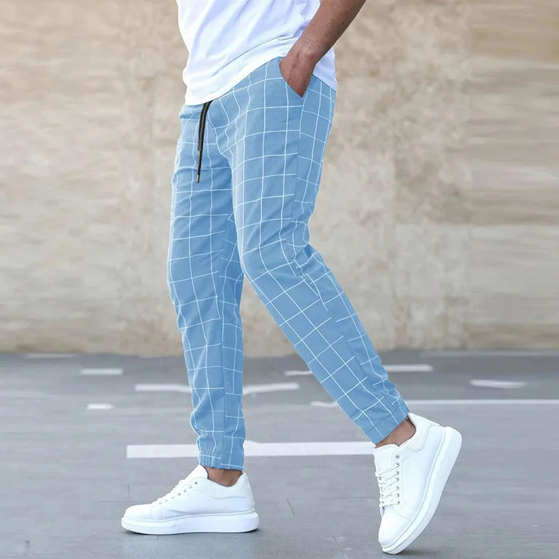 Comfortable navy blue men's joggers featuring a modern checkered pattern, ideal for daily casual wear.