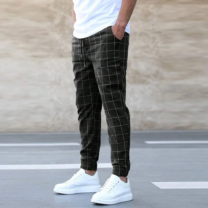 Trendy men's fashion joggers with a stylish checkered design and a comfortable tapered fit for streetwear.